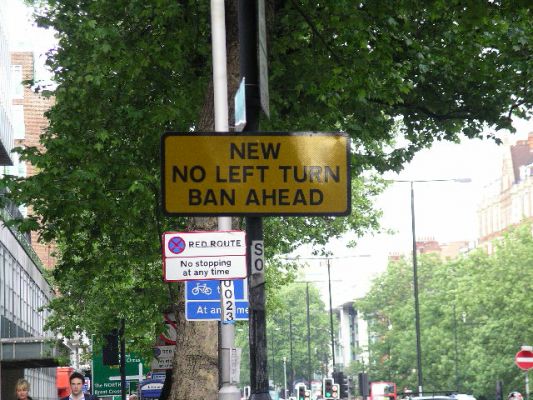 normal_Confusing_sign_on_the_Marylebone_Road.JPG - If no left turns are now banned ahead, does that mean I can turn left?